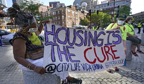 People marching to protest eviction