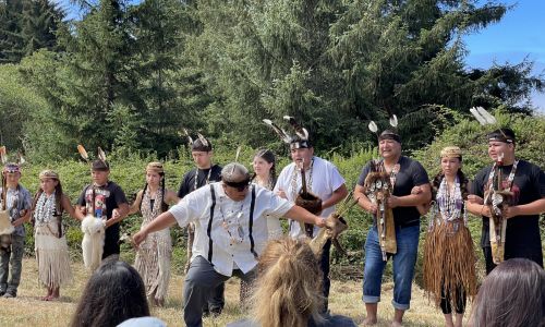 The Wiyot Tribal Chair leads tribal members in the opening ceremony celebration.