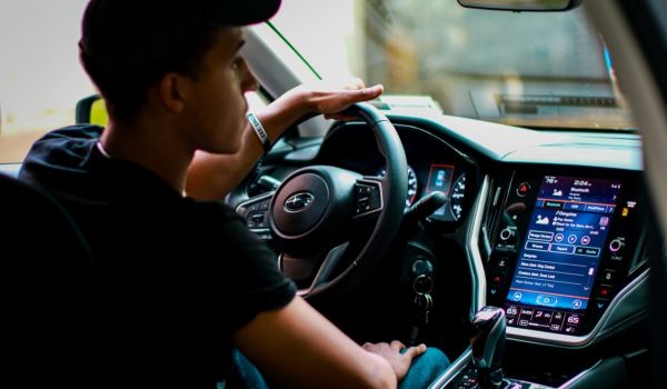 Young man driving a car