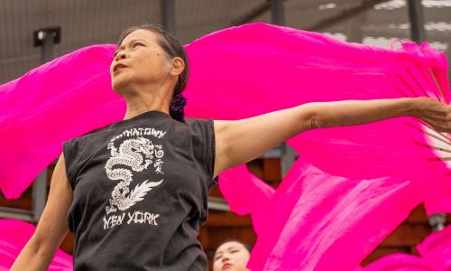 Margaret Yuen leads the Red Silk Dancers